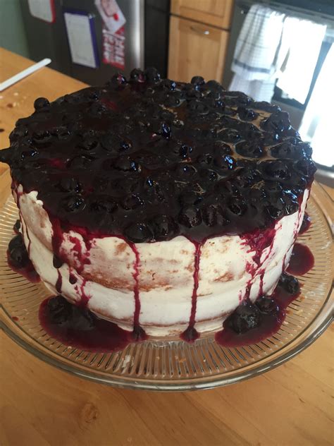 white cake with blueberry topping